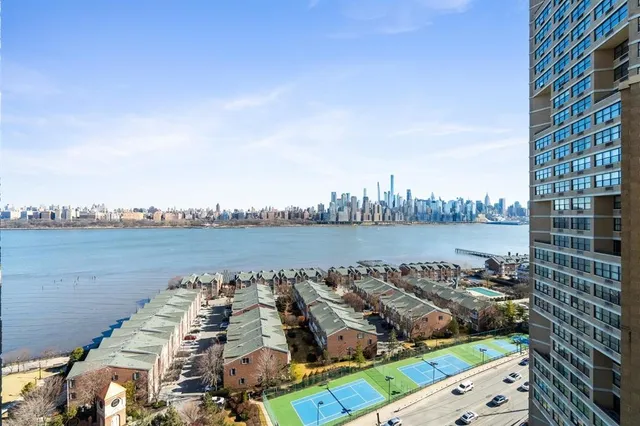 a view of a balcony with a ocean view