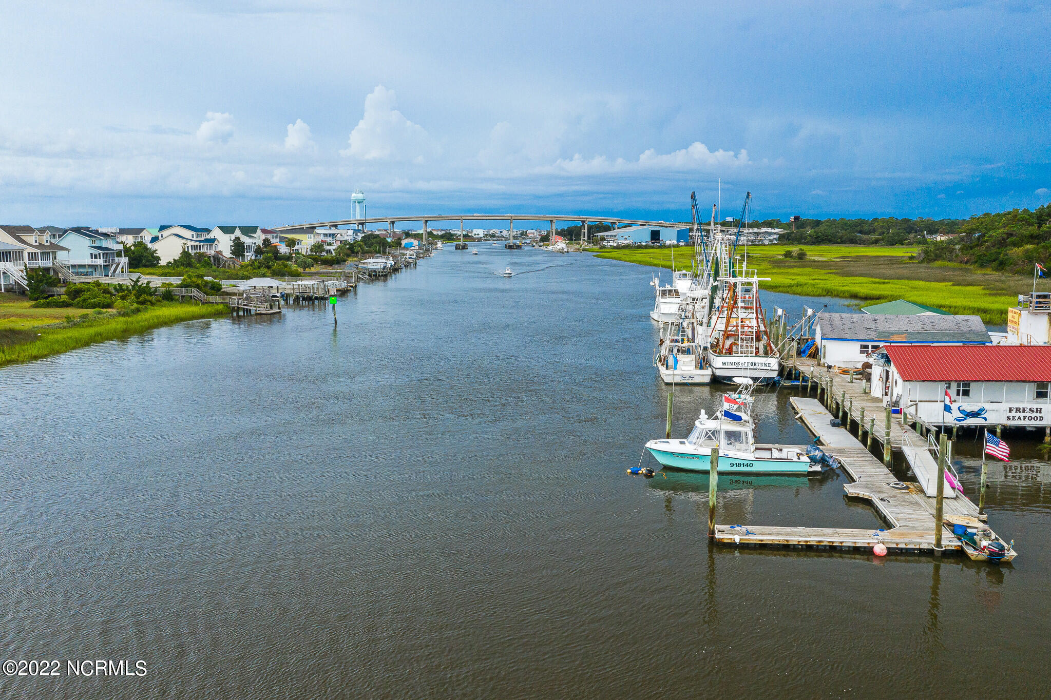 3113 Old Ferry Road Southwest Supply, NC 28462 - Photo 19 of 21 Old Ferry Rd and ICW, Seafood market and boats.