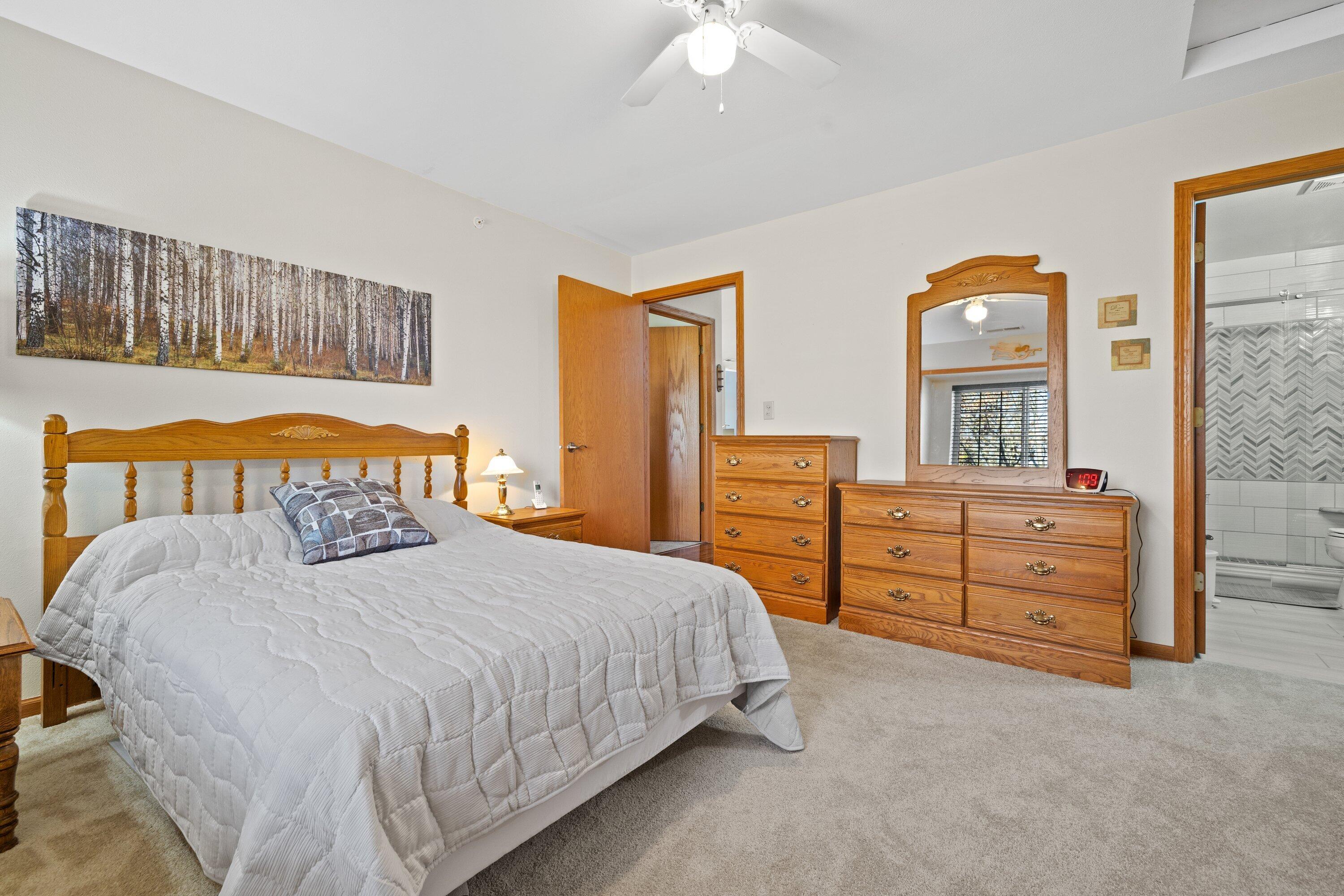 9322 West Loomis Road, Unit 4 Franklin, WI 53132 - Photo 17 of 26 Master Bedroom