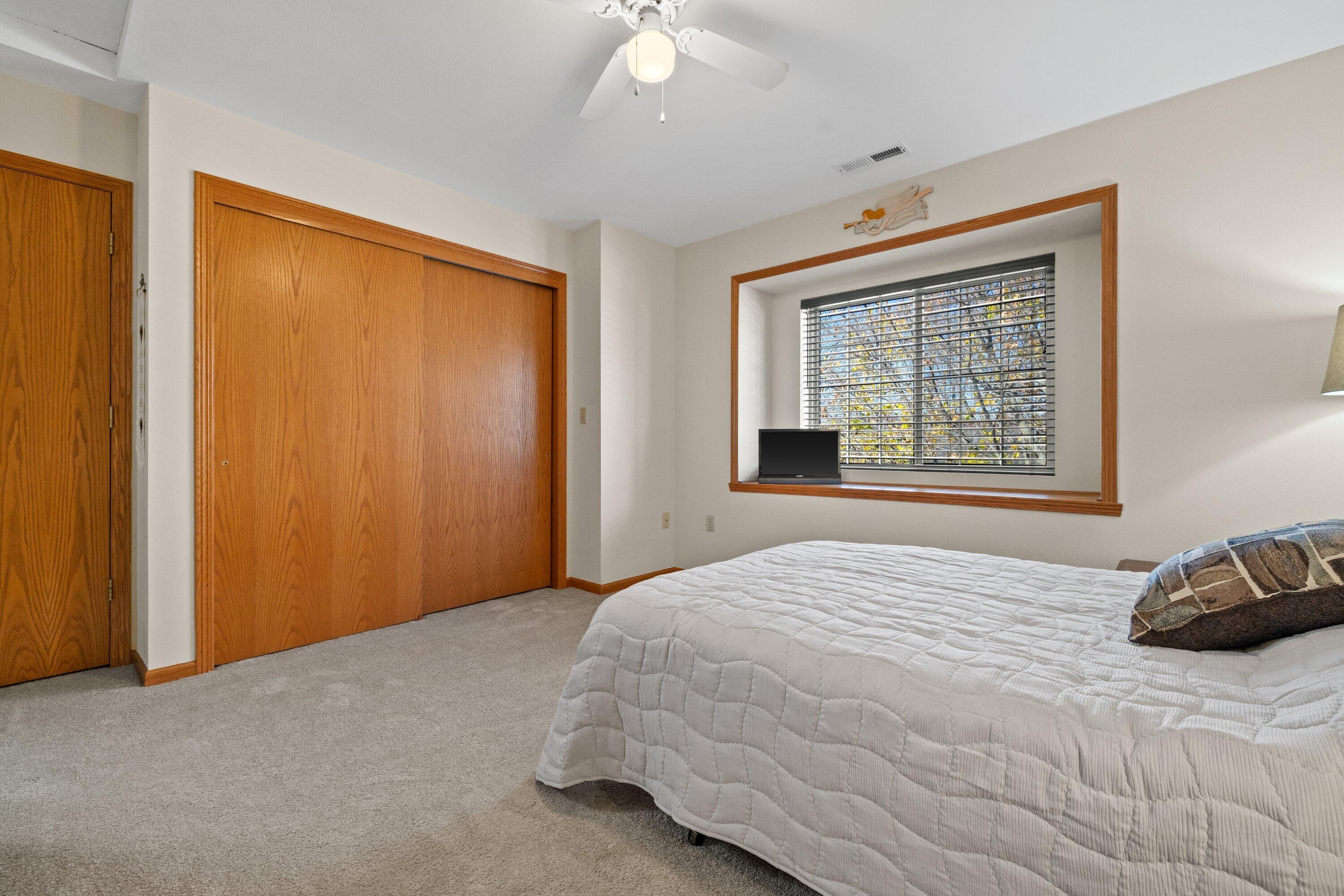 9322 West Loomis Road, Unit 4 Franklin, WI 53132 - Photo 18 of 26 Master Bedroom