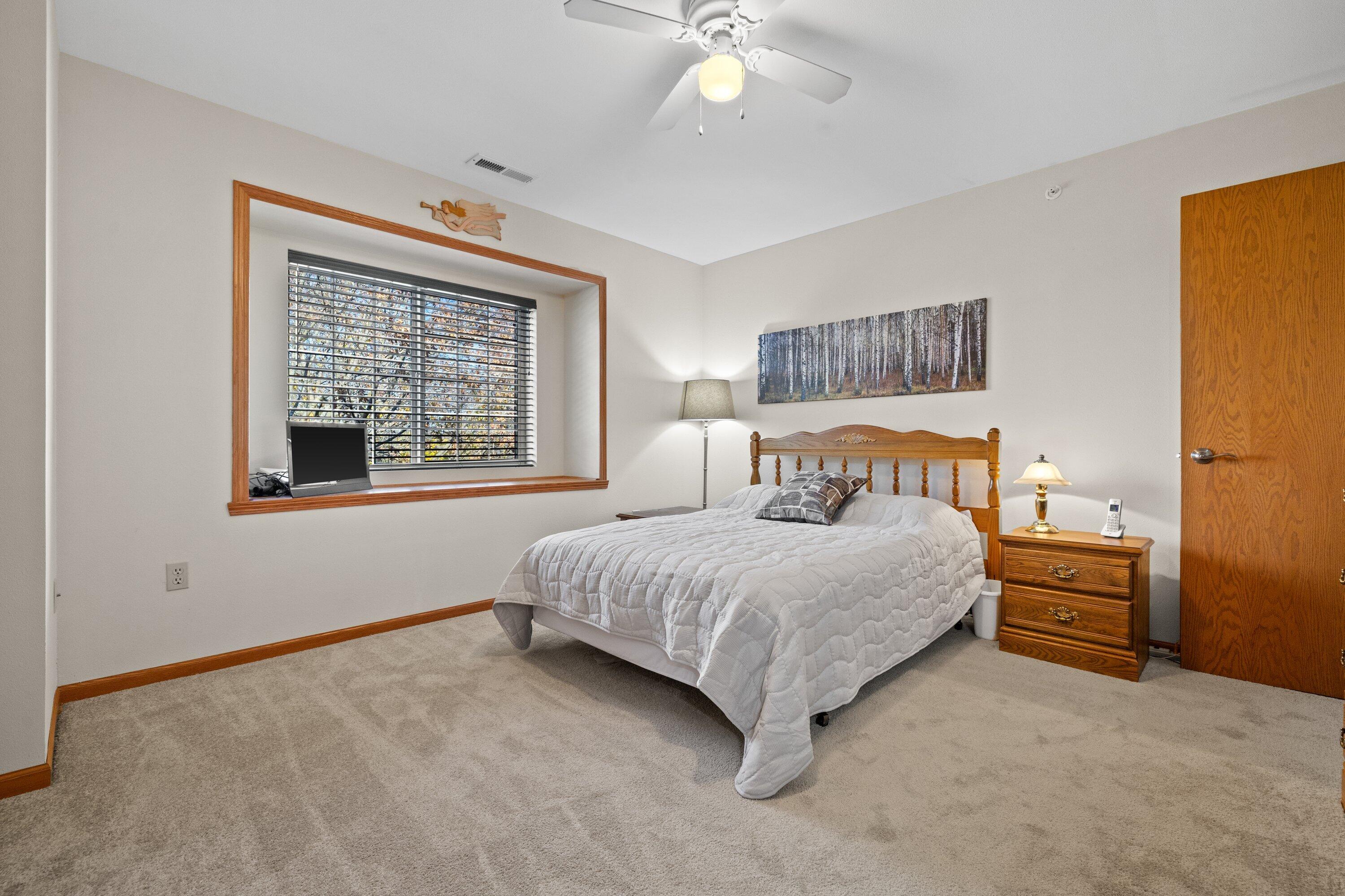 9322 West Loomis Road, Unit 4 Franklin, WI 53132 - Photo 19 of 26 Master Bedroom