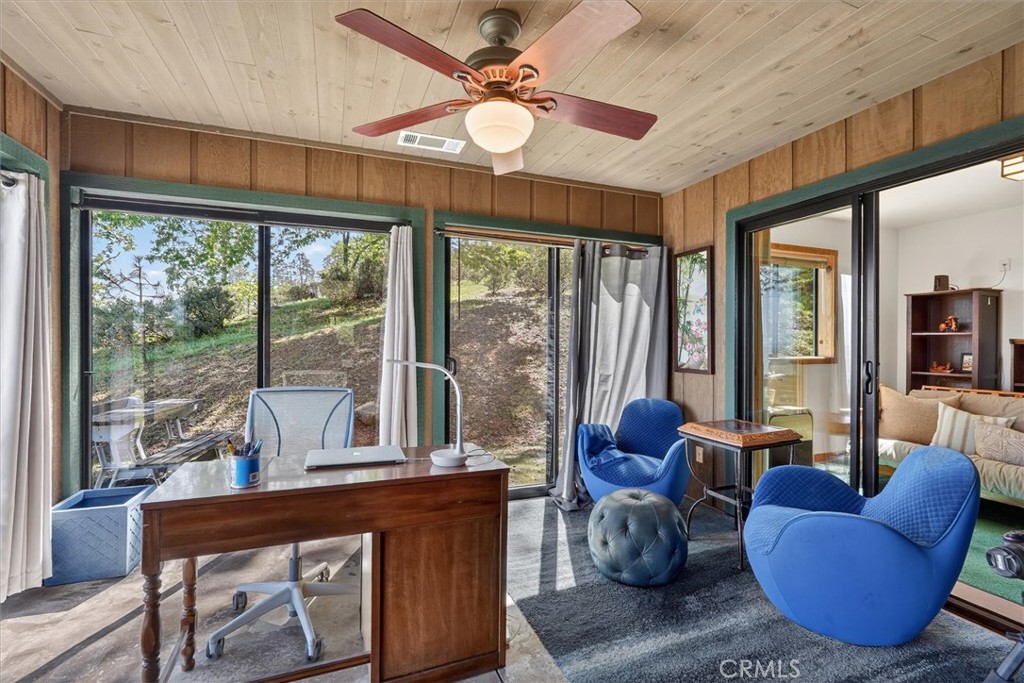 5851 Mt Bullion Ridge Road Mariposa, CA 95338 - Photo 16 of 58 a living room with furniture and a large window