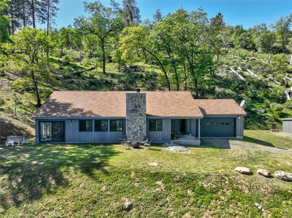 5851 Mt Bullion Ridge Road Mariposa, CA 95338 - Photo 3 of 58 a house view with a garden space