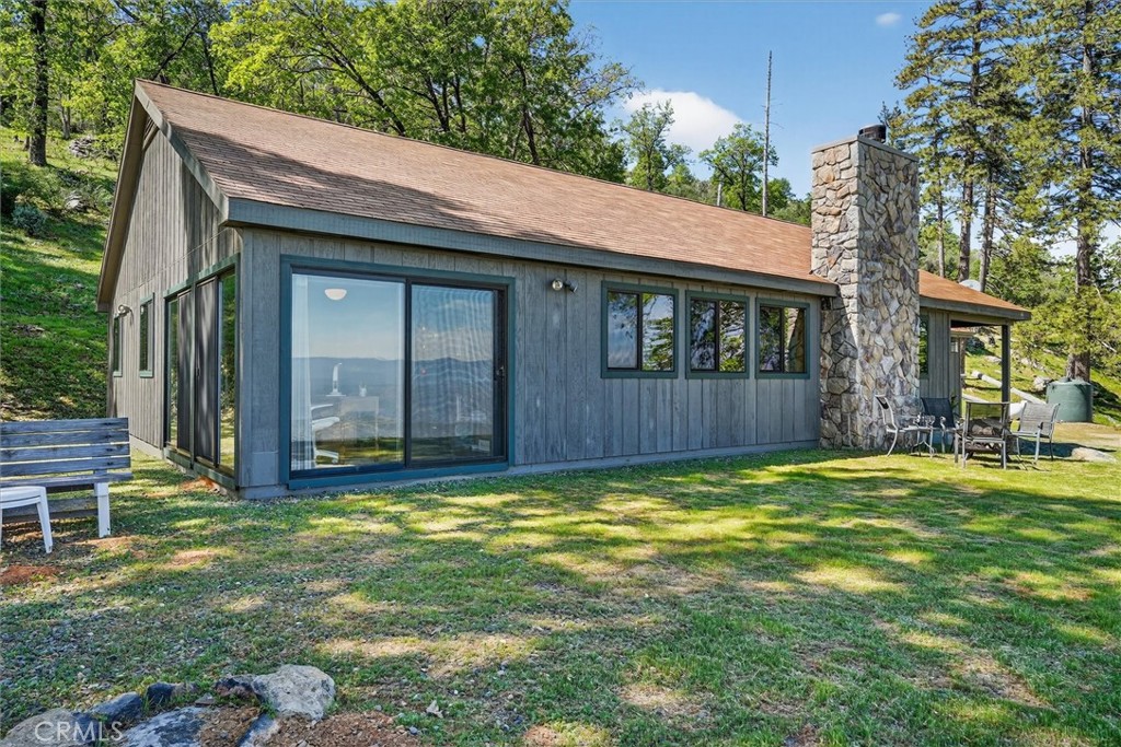 5851 Mt Bullion Ridge Road Mariposa, CA 95338 - Photo 4 of 58 a view of a house with backyard and porch