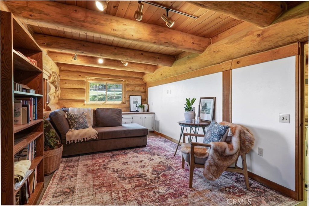 5851 Mt Bullion Ridge Road Mariposa, CA 95338 - Photo 44 of 58 a living room with furniture and a large window