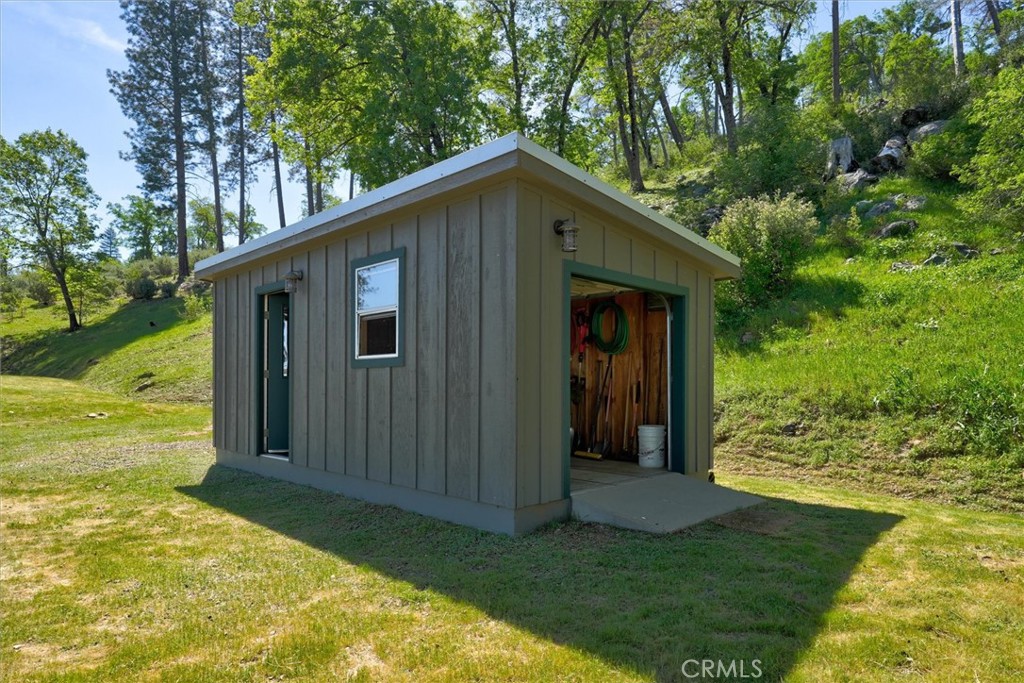 5851 Mt Bullion Ridge Road Mariposa, CA 95338 - Photo 50 of 58 a view of a house with a yard