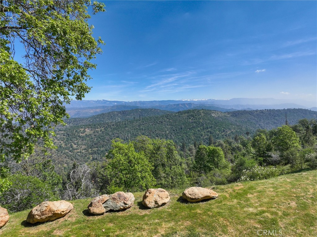 5851 Mt Bullion Ridge Road Mariposa, CA 95338 - Photo 57 of 58 a view of a table and chairs in a yard