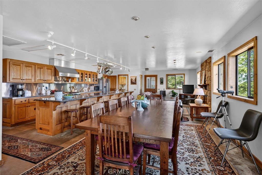 5851 Mt Bullion Ridge Road Mariposa, CA 95338 - Photo 9 of 58 a view of a dining room with furniture