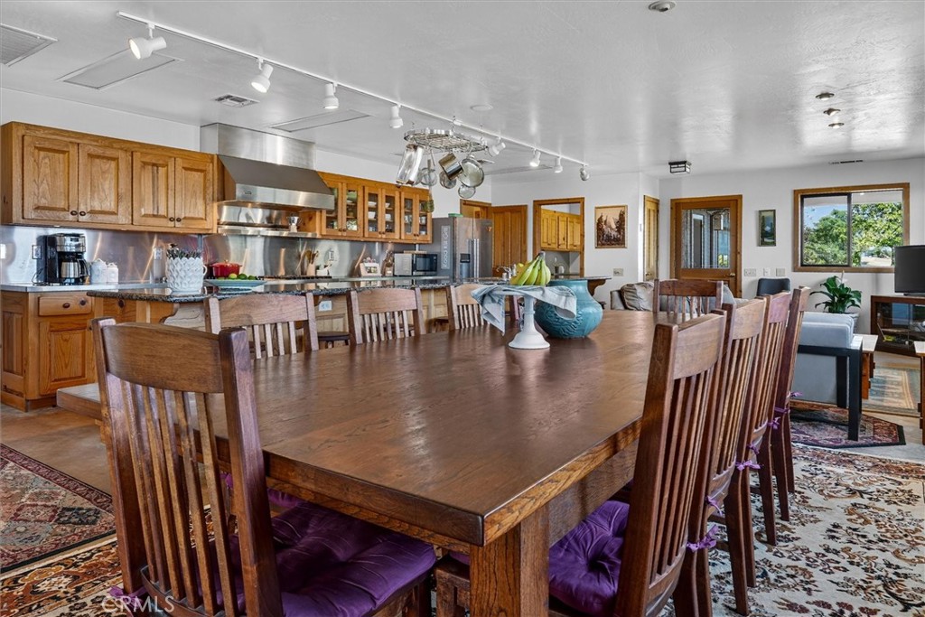 5851 Mt Bullion Ridge Road Mariposa, CA 95338 - Photo 10 of 58 a view of a dining room with furniture
