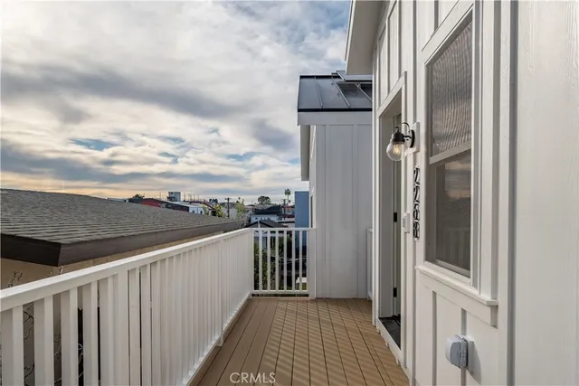 a view of a balcony with city view