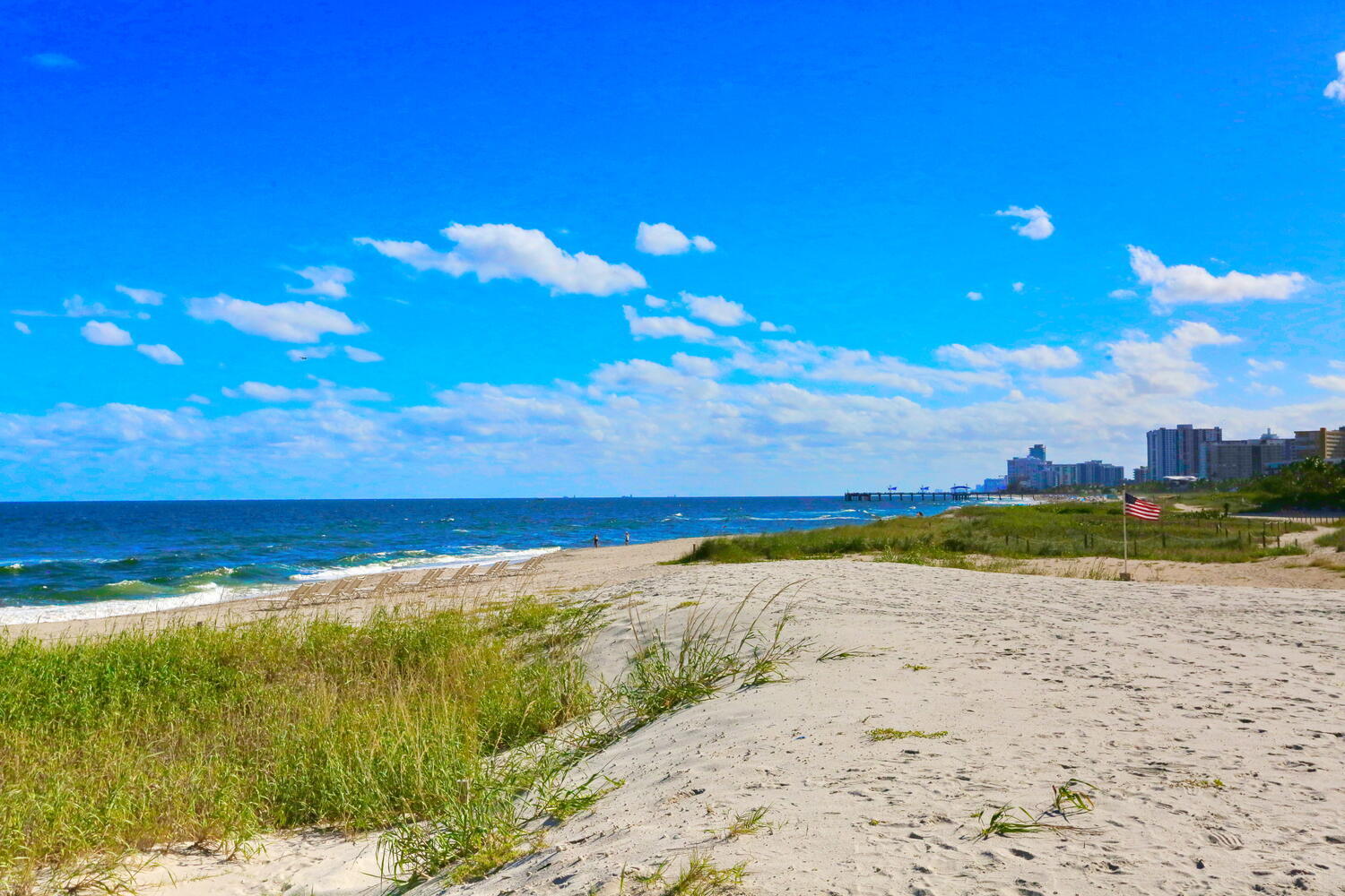 a view of an ocean beach and a building