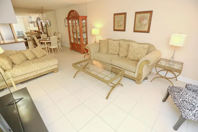 a living room with couch and a table