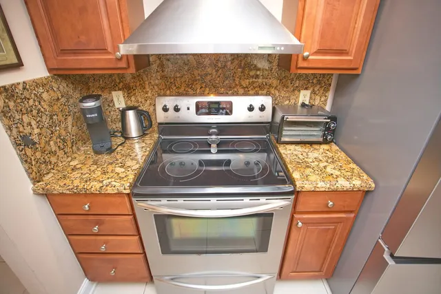 a view of kitchen and wooden floor