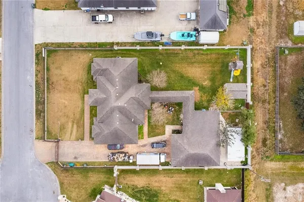 an aerial view of a house with swimming pool