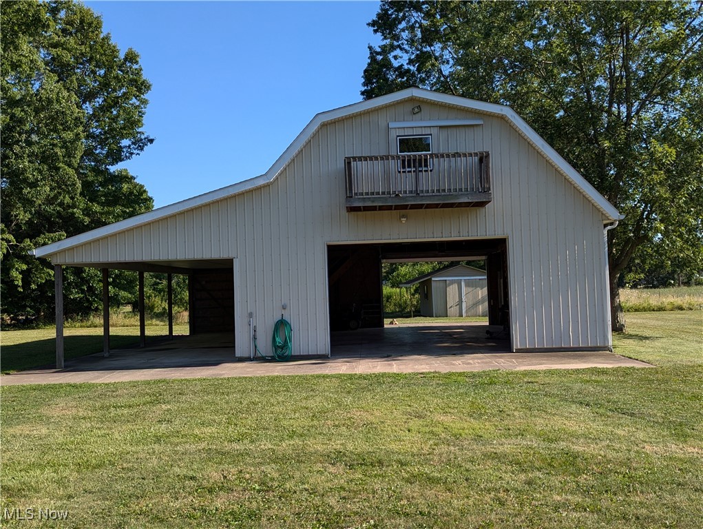 36155 Kinzel Road Avon, OH 44011 - Photo 27 of 38 Drive thru barn, front and rear automatic doors, covered vehicle port