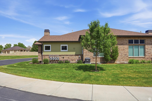 1838 West 300th Street South, Unit B Mapleton, UT 84664 - Photo 37 of 51 Brick and siding exterior with a brown shingle roof