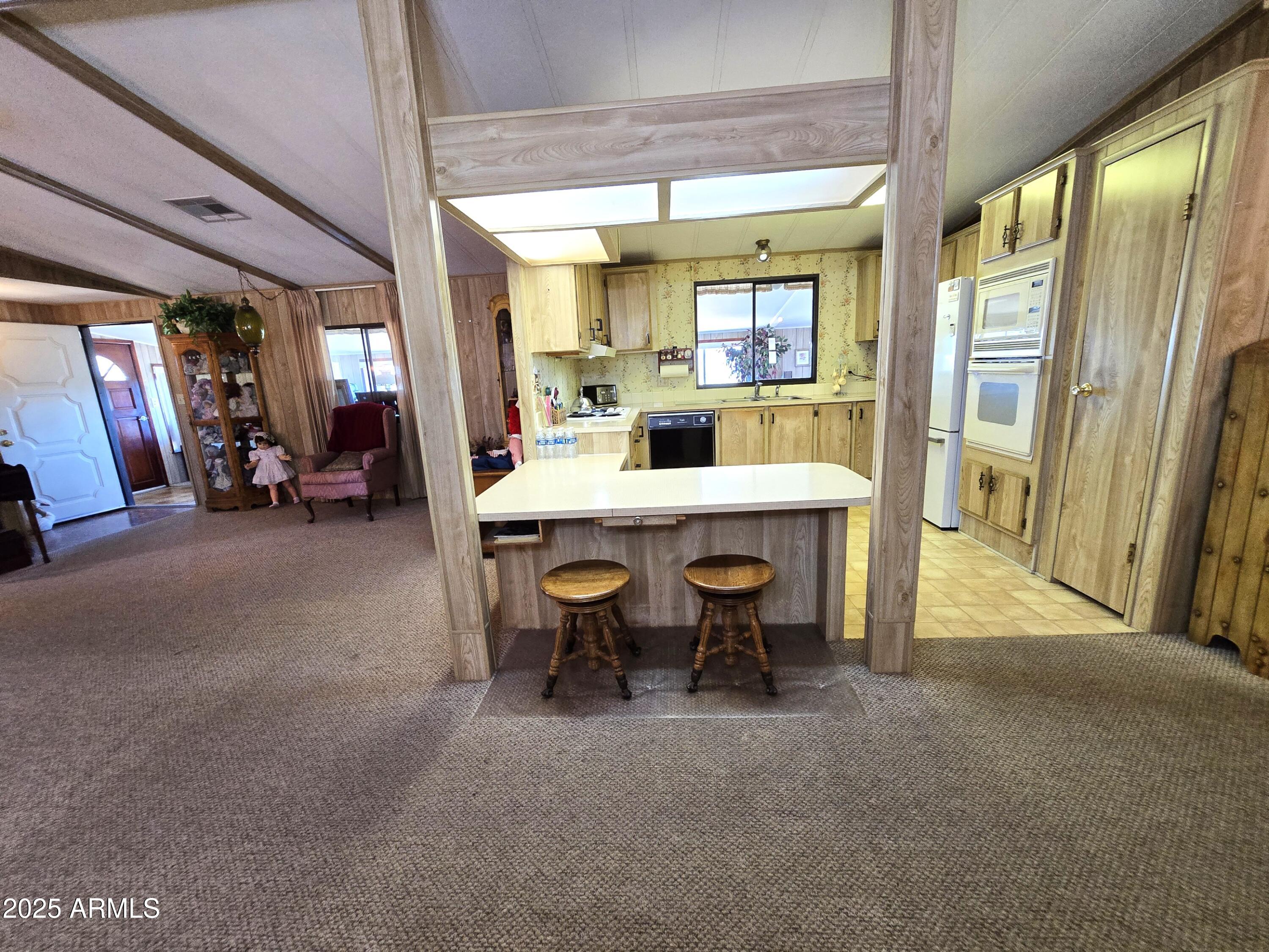 11965 Henderson Road Dewey, AZ 86327 - Photo 18 of 61 a view of a room with furniture and a large window