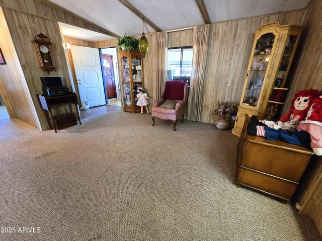 a kitchen with stainless steel appliances a stove a refrigerator sink and cabinets