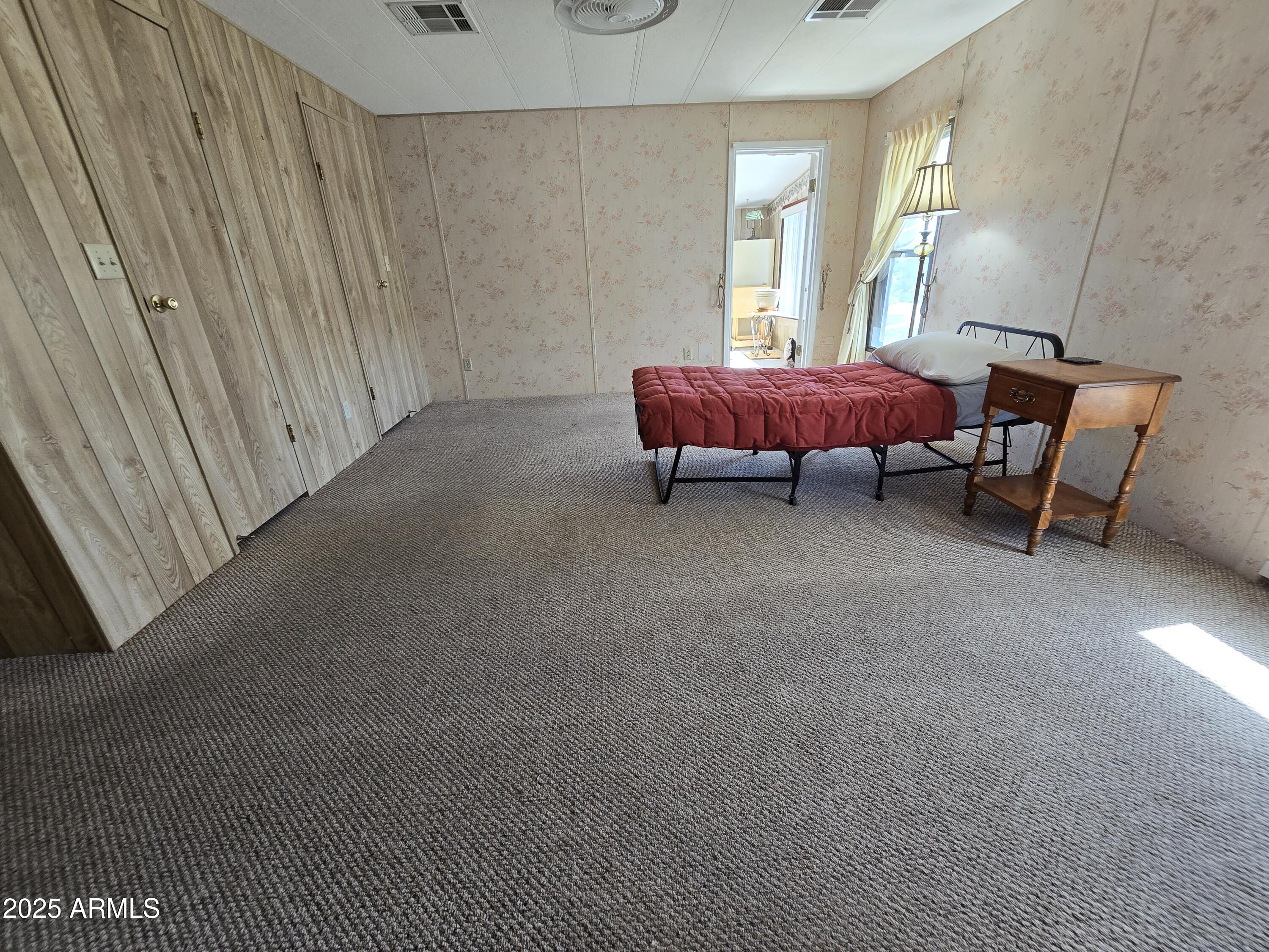 11965 Henderson Road Dewey, AZ 86327 - Photo 26 of 61 a living room with a couch and a table