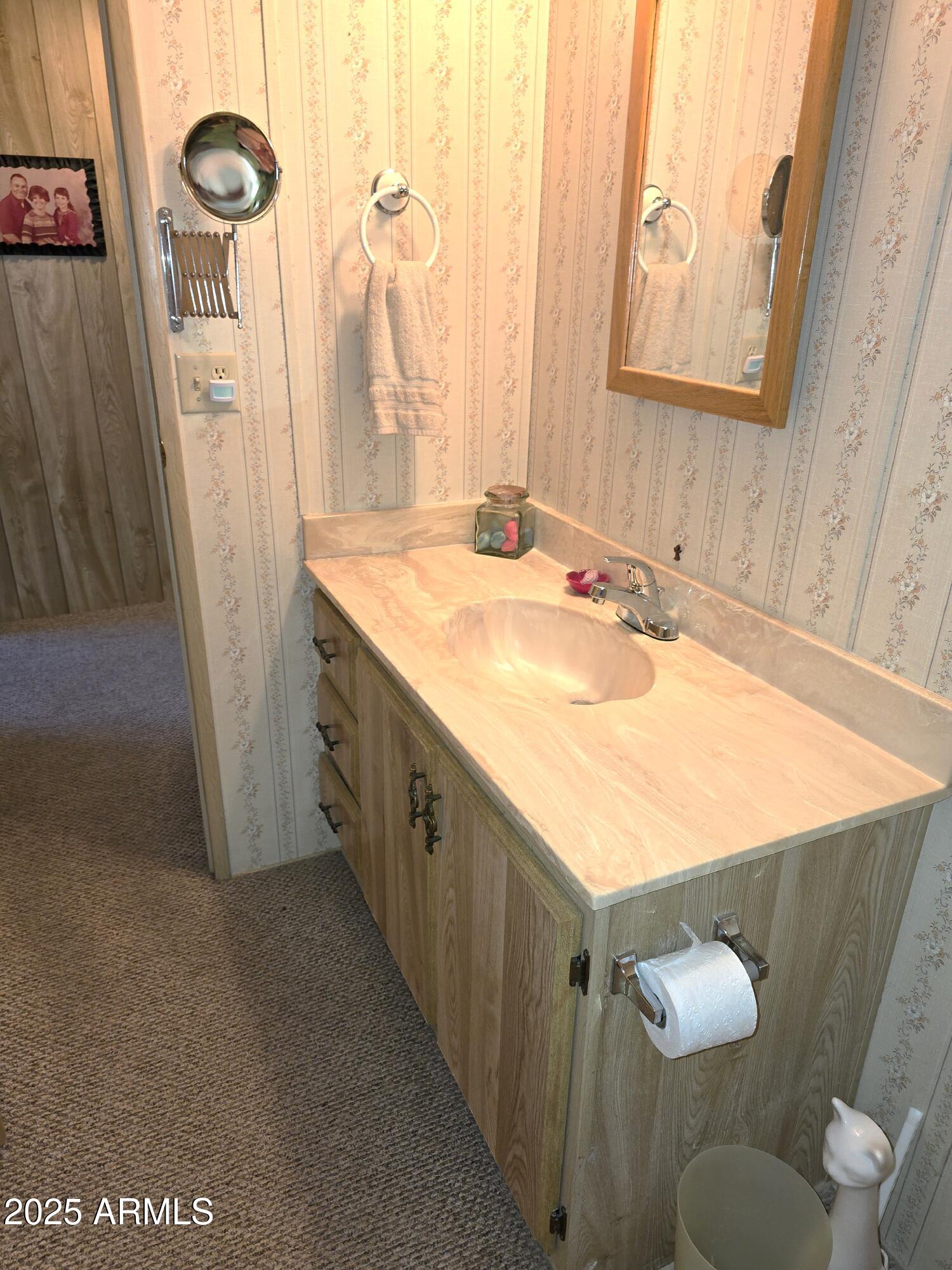 11965 Henderson Road Dewey, AZ 86327 - Photo 36 of 61 a bathroom with a sink and mirror