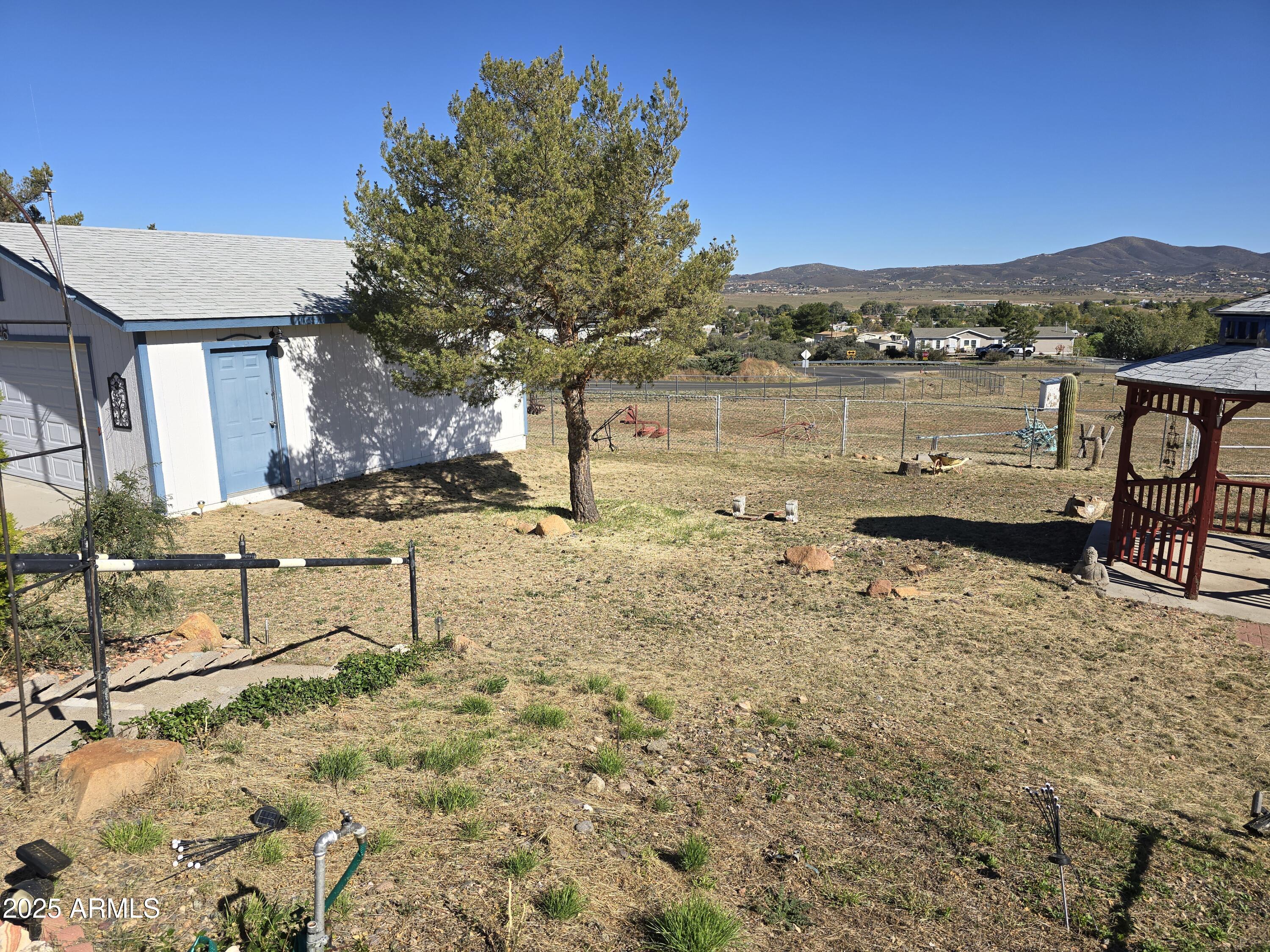 11965 Henderson Road Dewey, AZ 86327 - Photo 40 of 61 a view of a lake with a mountain