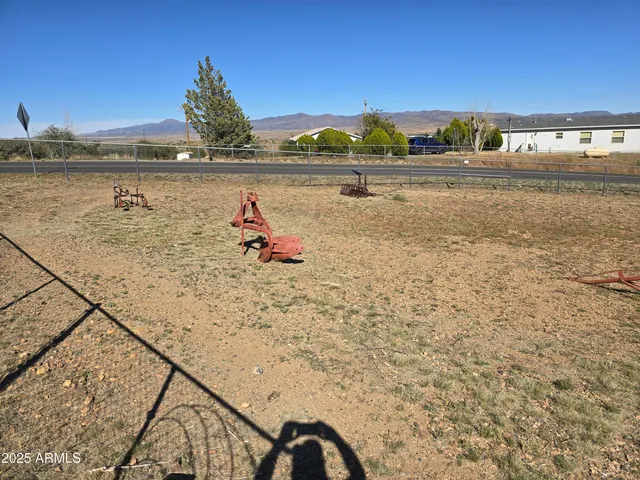 a view of a terrace with a forest