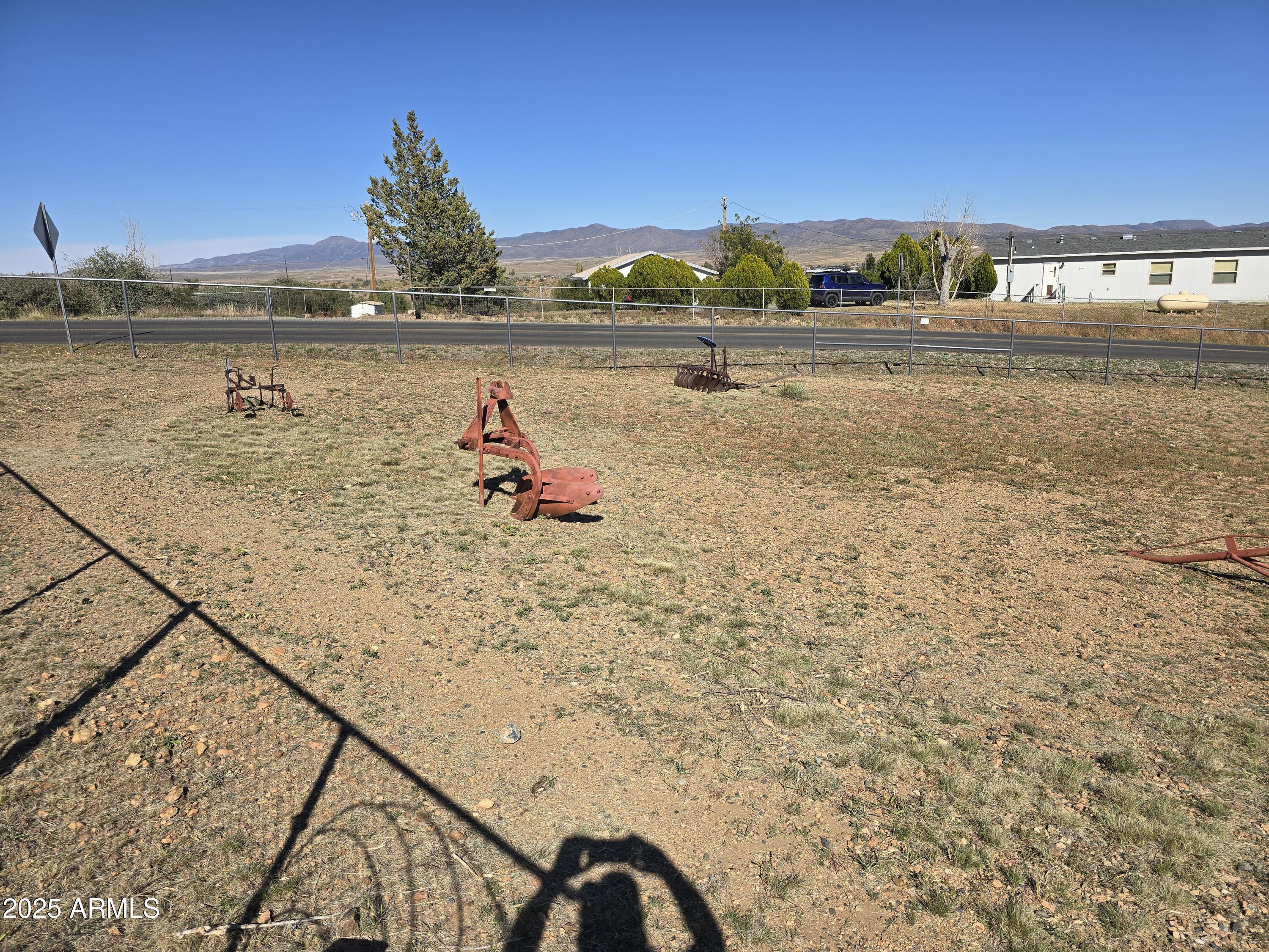11965 Henderson Road Dewey, AZ 86327 - Photo 44 of 61 a view of a lake with a mountain in the background