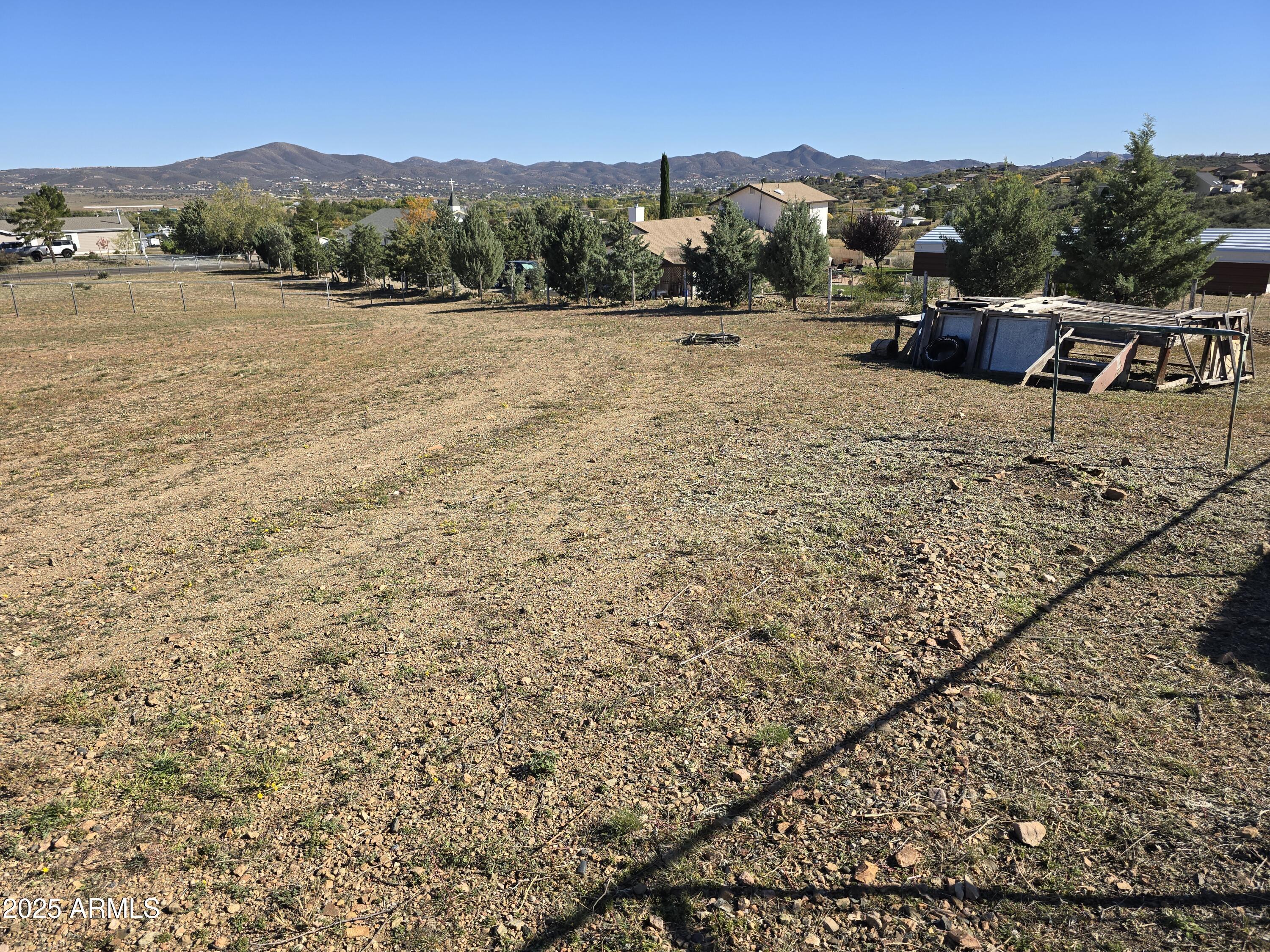 11965 Henderson Road Dewey, AZ 86327 - Photo 49 of 61 a view of a terrace with a garden
