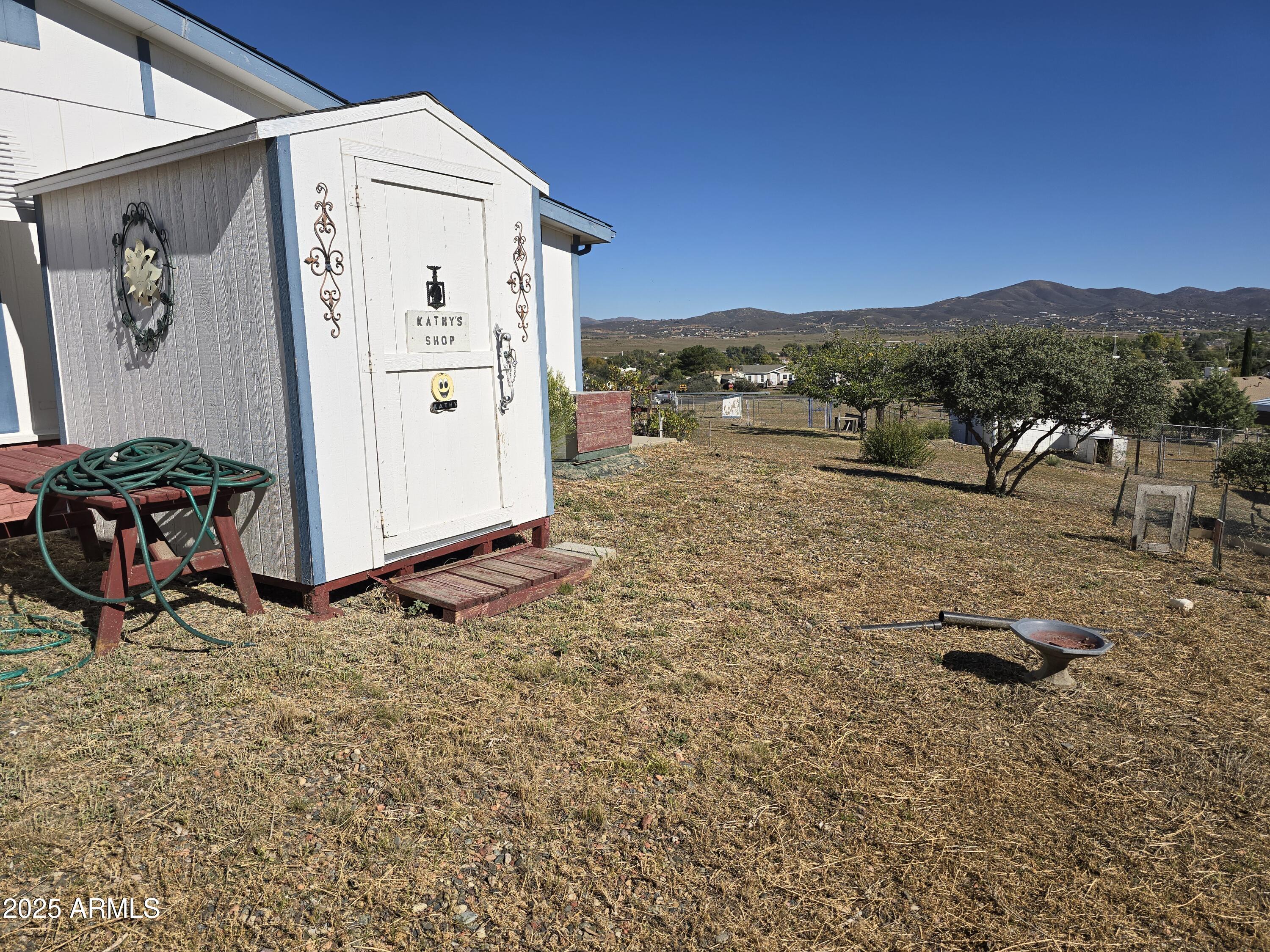 11965 Henderson Road Dewey, AZ 86327 - Photo 57 of 61 a view of a backyard of the house