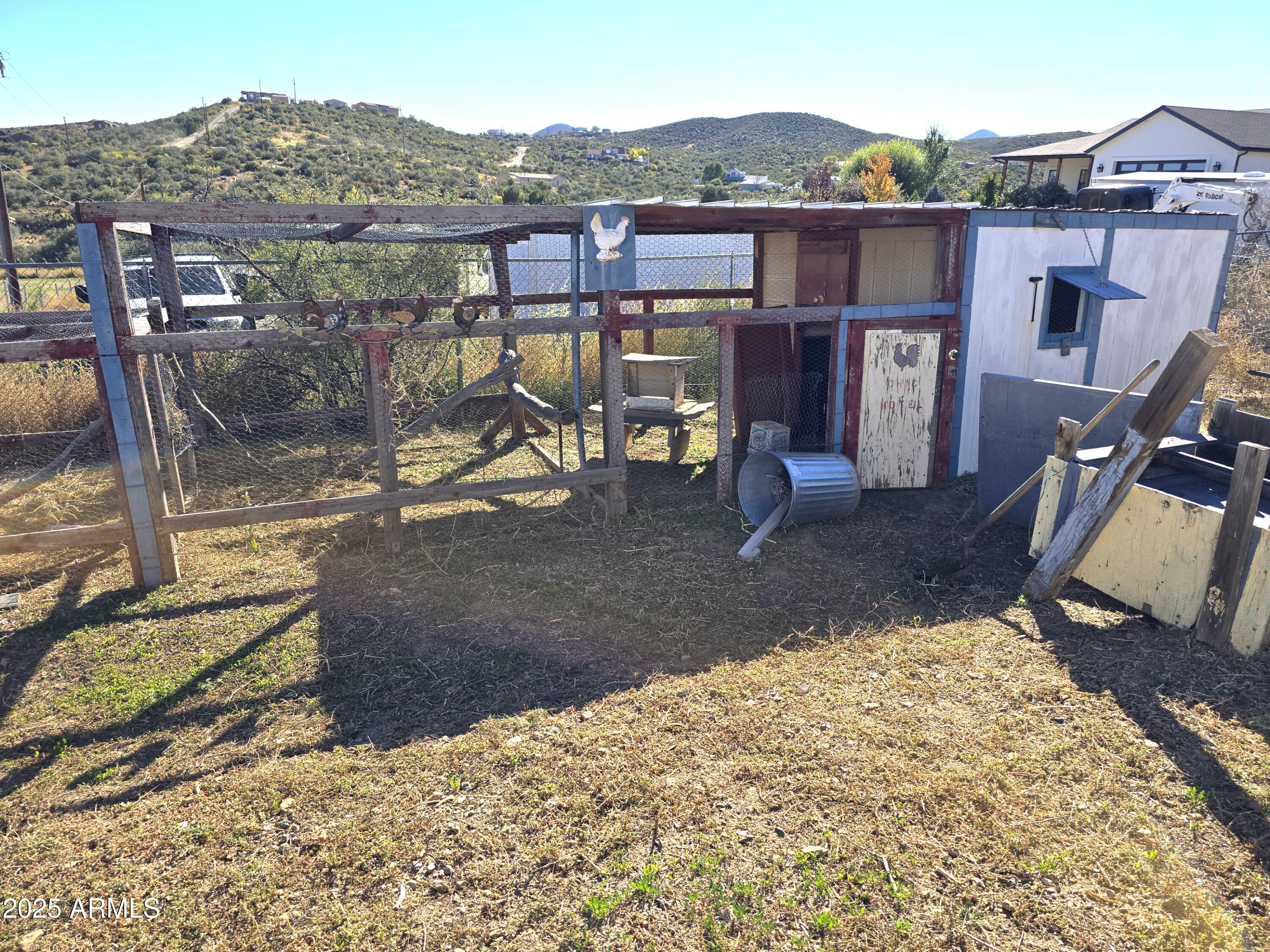 11965 Henderson Road Dewey, AZ 86327 - Photo 60 of 61 a view of a house with a yard