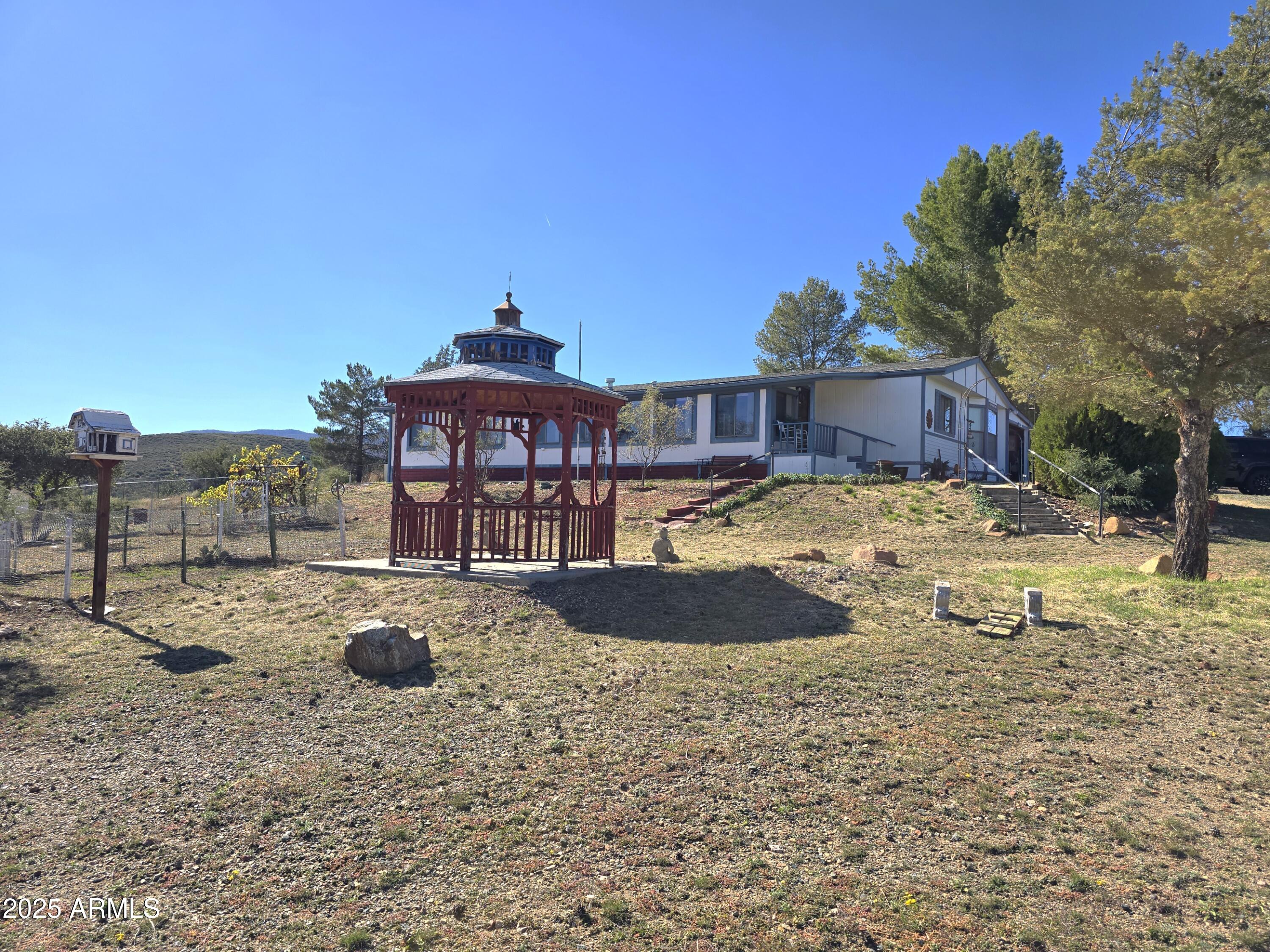 11965 Henderson Road Dewey, AZ 86327 - Photo 9 of 61 a view of a pool with a yard