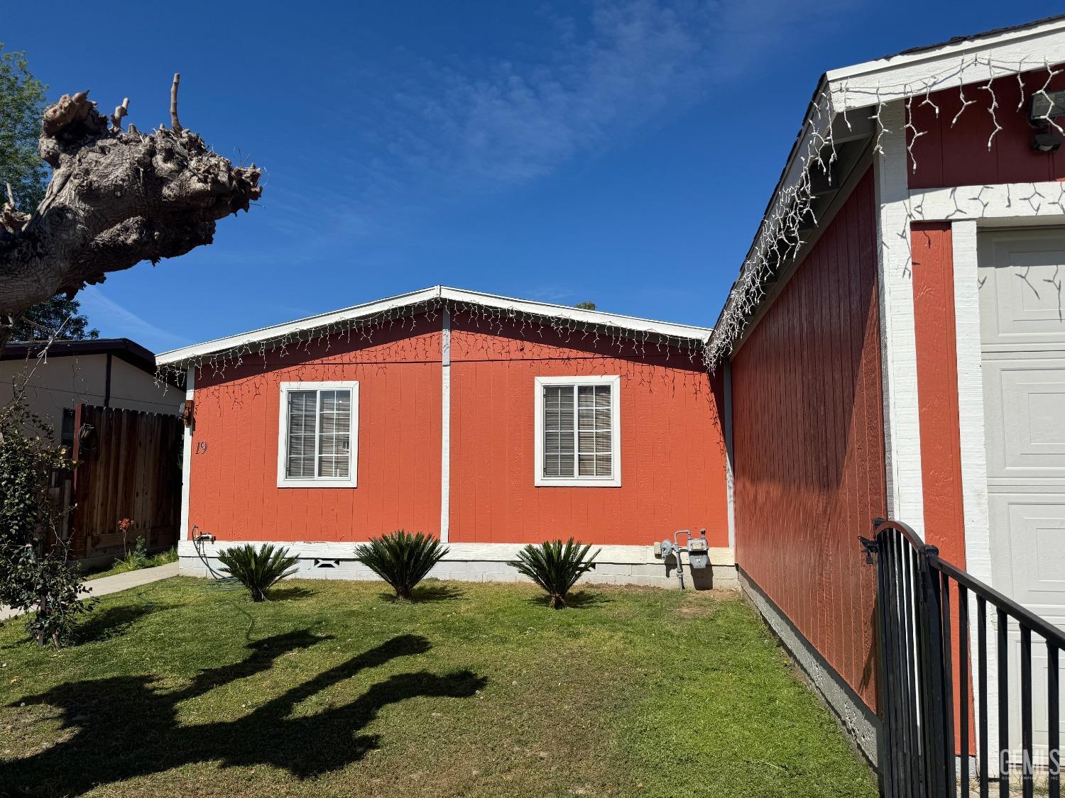 Undisclosed Address Bakersfield, CA 93307 - Photo 2 of 18 a front view of a house