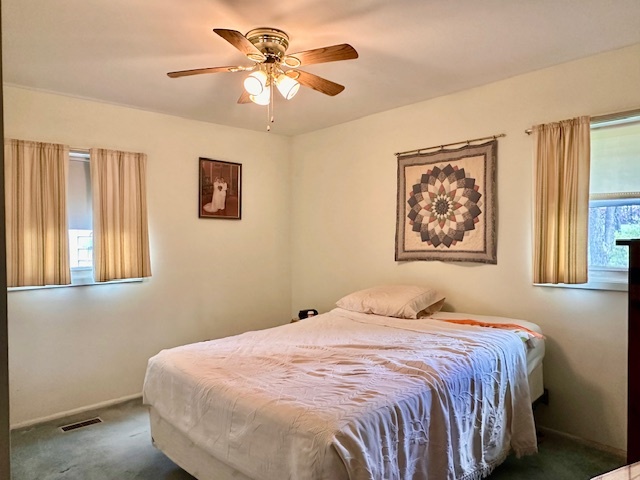 3103 Blair Drive Champaign, IL 61821 - Photo 13 of 20 a bedroom with a large bed and a window