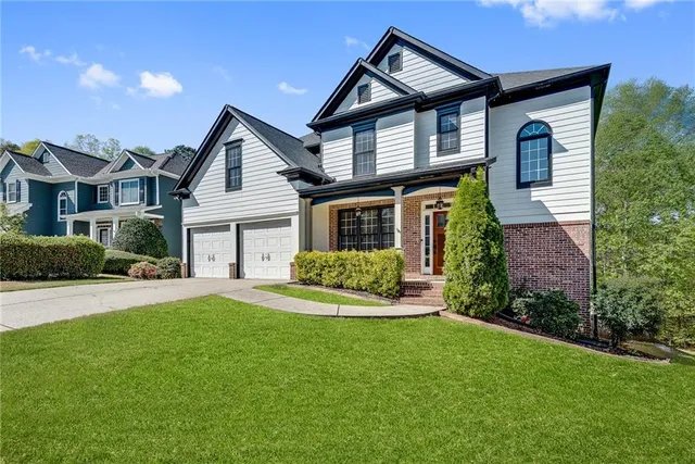 front view of a house with a yard