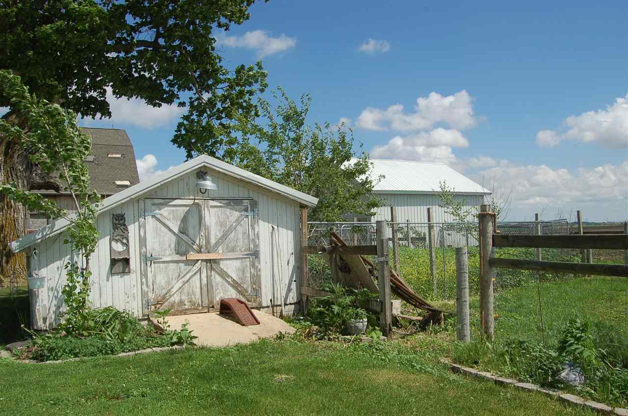 27754 West Elm Road Sterling, IL 61081 - Photo 16 of 19 a view of a garden with a slide and a lake view