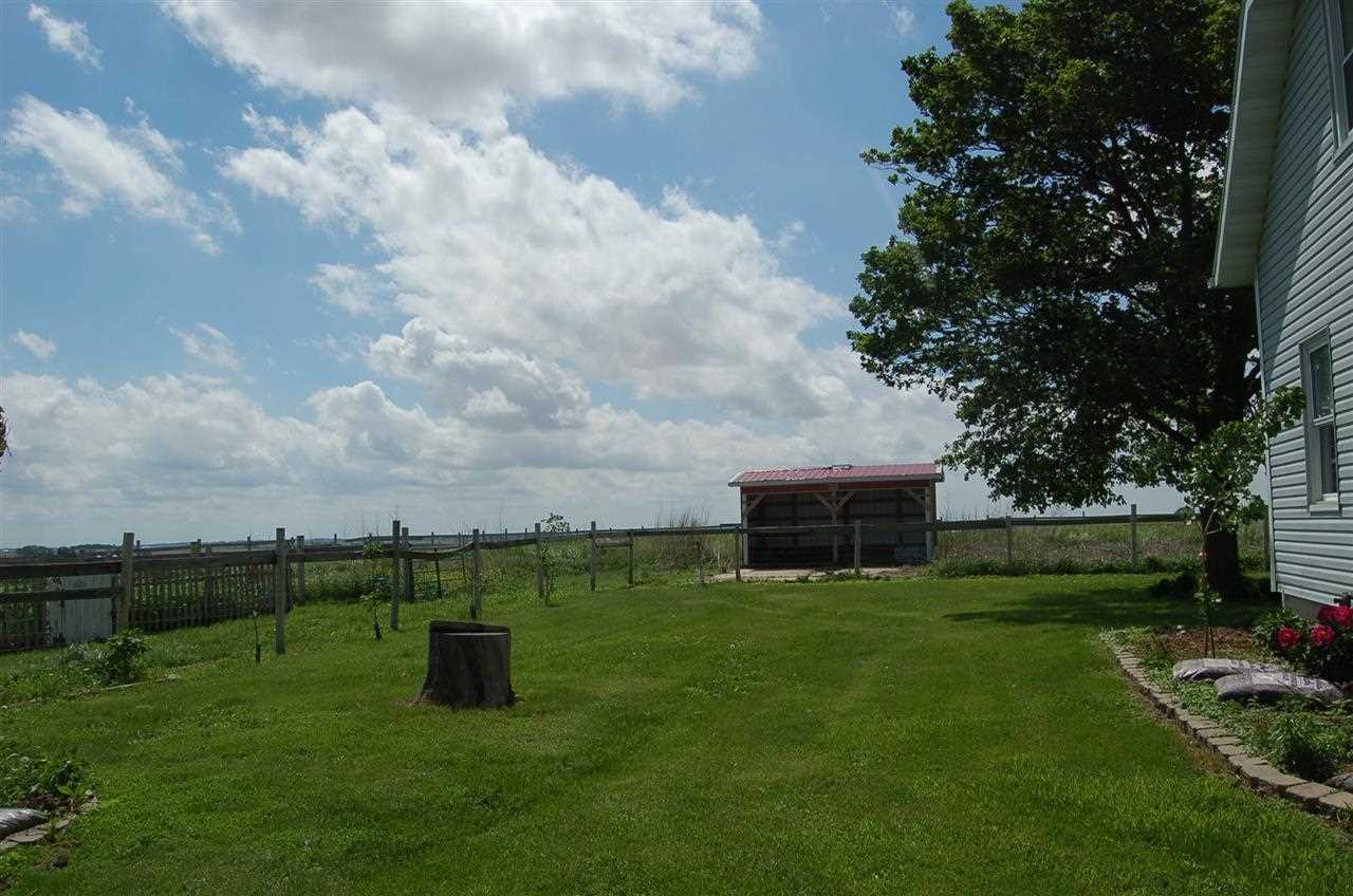 27754 West Elm Road Sterling, IL 61081 - Photo 17 of 19 a view of an house with backyard space and garden