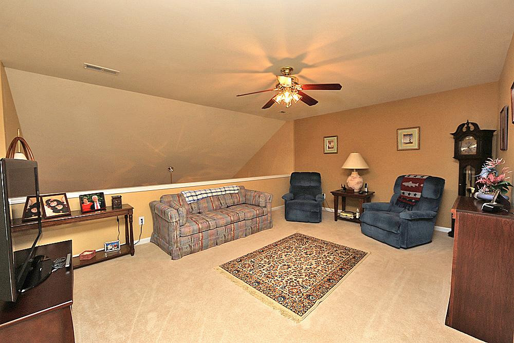 5333 Brandy Bay Road Raleigh, NC 27613 - Photo 15 of 20 The large loft overlooks the living room. Loft