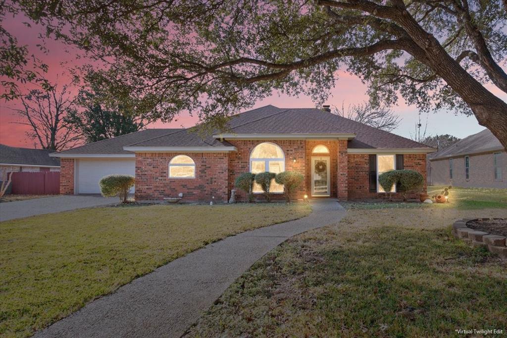 327 East Chapman Road Hewitt, TX 76643 - Photo 1 of 30 a front view of a house with a yard