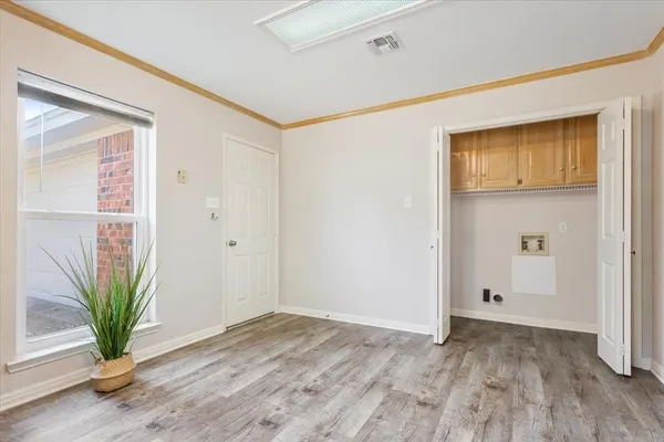 a bathroom with a shower curtain and a sink