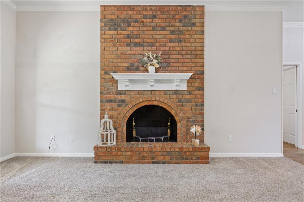 327 East Chapman Road Hewitt, TX 76643 - Photo 10 of 30 a living room with a fireplace
