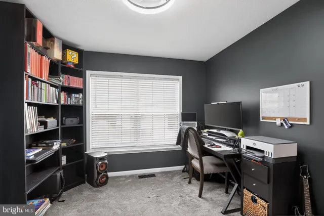 a view of a workspace with a window and workspace