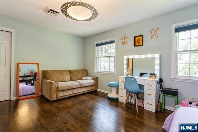 437 Summit Street Englewood Cliffs, NJ 07632 - Photo 13 of 25 a living room with furniture and a wooden floor