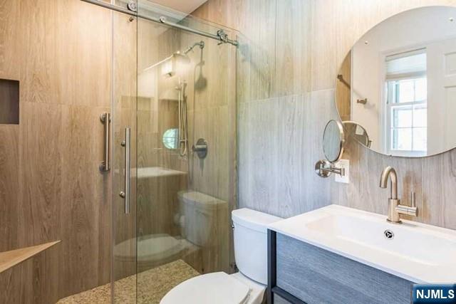 437 Summit Street Englewood Cliffs, NJ 07632 - Photo 18 of 25 a bathroom with a sink toilet and shower