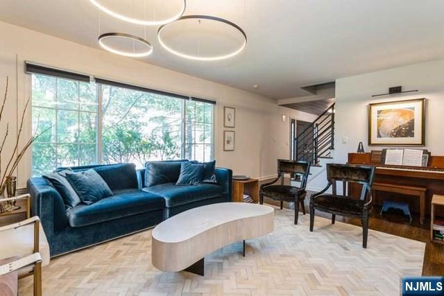437 Summit Street Englewood Cliffs, NJ 07632 - Photo 4 of 25 a living room with furniture and a large window