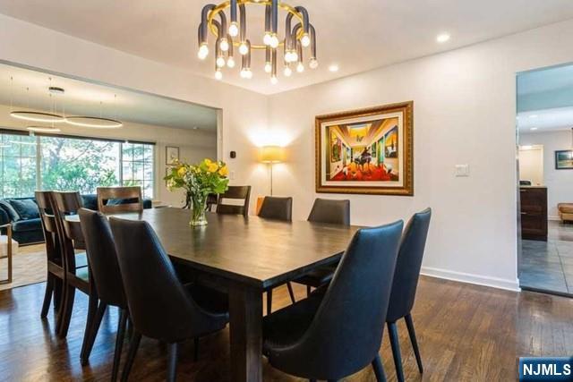 437 Summit Street Englewood Cliffs, NJ 07632 - Photo 7 of 25 a view of a dining room with furniture window and wooden floor