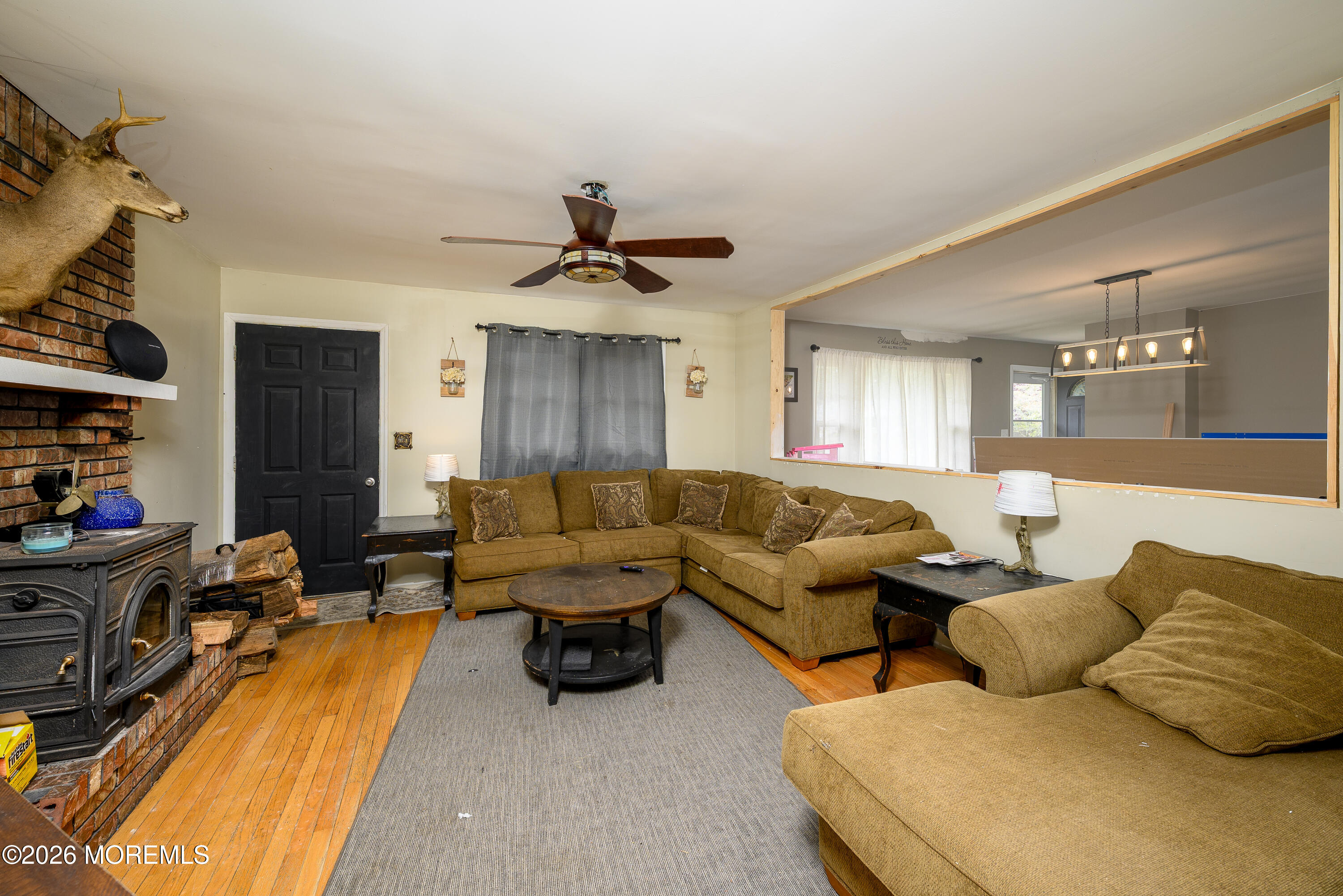 2 Lawrence Avenue Howell, NJ 07731 - Photo 4 of 10 a living room with furniture and a flat screen tv