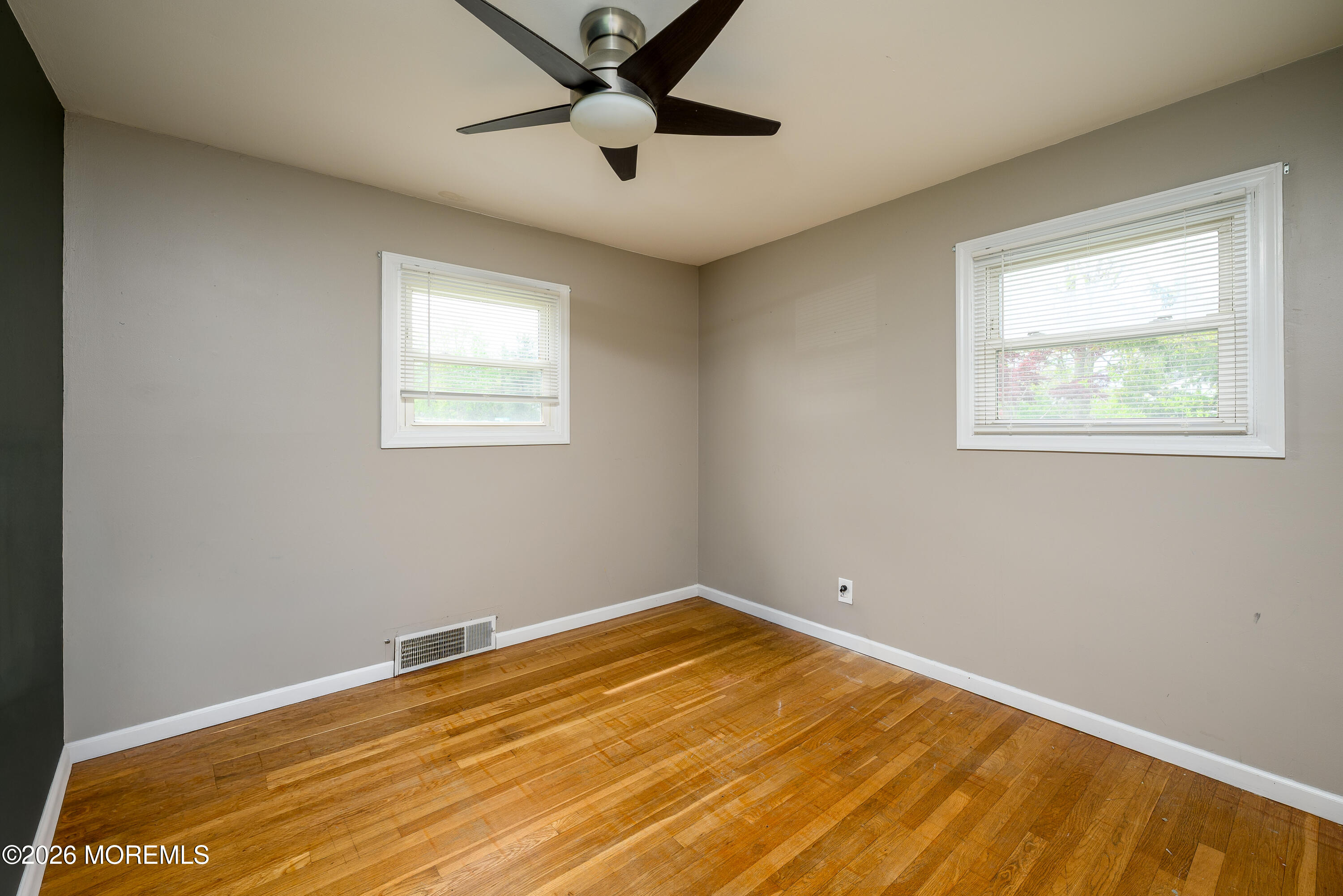 2 Lawrence Avenue Howell, NJ 07731 - Photo 6 of 10 a view of empty room with wooden floor