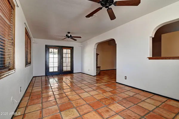 a view of an empty room and window
