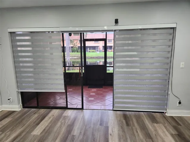 a view of an entryway with a garden