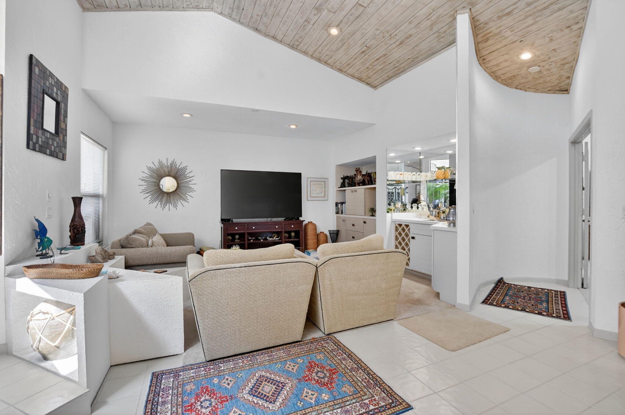 22519 Esplanada Circle, Unit W Boca Raton, FL 33433 - Photo 8 of 57 a living room with furniture and a flat screen tv
